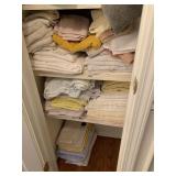 2 PACKED SHELVES OF TOWELS OF ALL SIZES