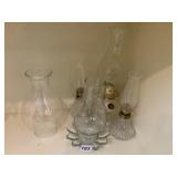 THREE OIL LAMPS AND EXTRA GLOBE PLUS GLASS DISH