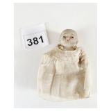 SMALL BISQUE DOLL WITH MUSLIN DRESS BODY IS