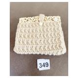 CROCHETED HANDBAG WITH CARVED POSSIBLY BONE BAR