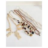 SEASHELL NECKLACE CARVED WOOD PEOPLE FIGURE