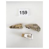 GROUP OF RAILROAD TIE CLIPS