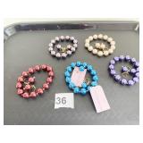 SET OF FIVE HAROLD C MILLER COLOR PEARL BEAD