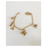 18K GOLD LINK CHARM7.5" BRACELET W/ 6 - 14K GOLD