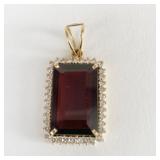 18K GOLD PENDANT W/ EMERALD CUT GARNET CENTER