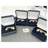 GOLD TONE PIN WITH MAPLE LEAF FOUR BOXED