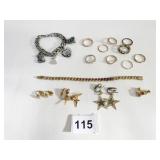 CHARM BRACELET ASSORTED RINGS GOLD TONE RED STONE