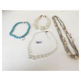 TRIPLE STRAND RHINESTONE AND CHUNKY FAUX GLASS