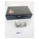 CLEAR GLASS PAPERWEIGHT WITH BUILDING MARKED AC