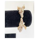 GOLD TONE HINGED GIRAFFE BRACELET WITH