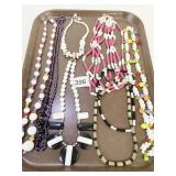GROUP OF NOVELTY BEADED NECKLACES WHITE BLACK AND