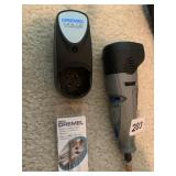 DREMEL TOOL W/ CHARGER AND EXTRA CARBINE CUTTER