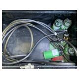 PROPANE BOTTLES AND GARDEN HOSE