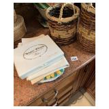 2 WICKER BASKETS, OVEN MITTS, ETC.
