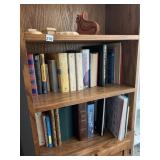 MOSTLY HARD BACK BOOKS AND WOODEN FIGURINES