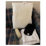 PHONE, PILLOW, SHEET AND BASEBALL CAP