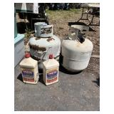1 PARTIAL, 1 EMPTY PROPANE TANKS AND CHARCOAL
