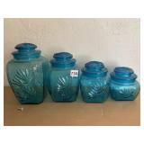 4 BLUE GLASS JARS W/ LIDS