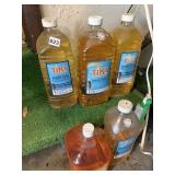 TIKI TORCH FUEL 5 BOTTLES - 1 NOT FULL