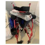 WHEELCHAIR WITH FOOT HOLDERS