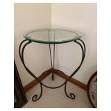 GLASS TOP THREE FOOTED METAL TABLE 24X17