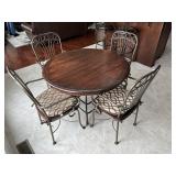 IRON BASE ROUND DINING AND 4 ARMCHAIRS - 42" AND