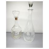 DECANTERS, ONE ETCHED GLASS AND ONE WITH CORK TOP
