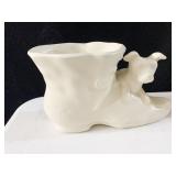 CERAMIC PLANTER DOG ON SHOE 8 W X 4.5 H
