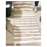 TWO MAROON & OLIVE ON CREAM COLORED THROW RUGS