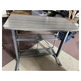 ADJUSTABLE TABLE 32. 5 H X 31 W X 20 D