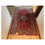 AREA RUG 52" X 32"