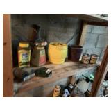 SHELF CONTAINING RUST OLEUM CANS, PLANTERS,