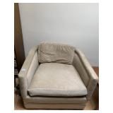 TAN ARMCHAIR ON CASTERS W/ ADJUSTABLE BACK PILLOW