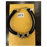 VINTAGE CORD NECKLACE WITH GOLD DESIGNS