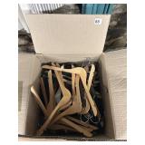 ASSORTED BOX OF WOODEN HANGERS