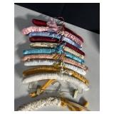 ELEVEN VINTAGE SATIN CLOTHES HANGERS