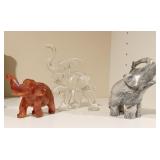 GLASS ELEPHANTS AND STONE ELEPHANT