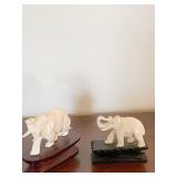 2 IVORY ELEPHANTS W/ TRUNKS UP