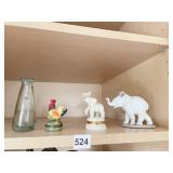 LLADRO 4" H ELEPHANT W/ PORCELAIN FLOUR ON LEFT