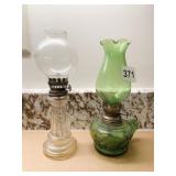 2 OIL LAMPS BOTH MADE IN HONG KONG ONE W/ LEAF