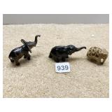 TWO STONE CARVED ELEPHANTS AND ONE PORCELAIN