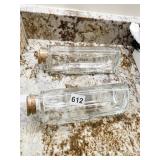 TWO FLAT WALL GLASS JARS