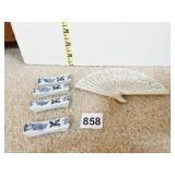 4" PLASTIC FAN AND 4 PORCELAIN CHOP STICK RESTS