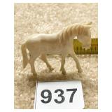 CARVED HORSE IVORY -TWO INCH LONG BY ONE AND A