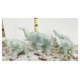 GROUP OF 4 ELEPHANTS VARIOUS SIZES