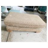 UPHOLSTERED TAN OTTOMAN
