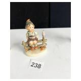 HUMMEL SCHOOL BOY ON FENCE FIGURINE