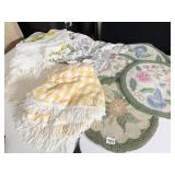 4 HAND MADE SEAT CUSHIONS AND TABLE CLOTHES