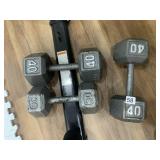 PAIR 40 LB. HAND WEIGHTS AND 1- 30 LB.