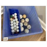 ASSORTED GOLF BALLS AND BASEBALLS IN BLUE BIN